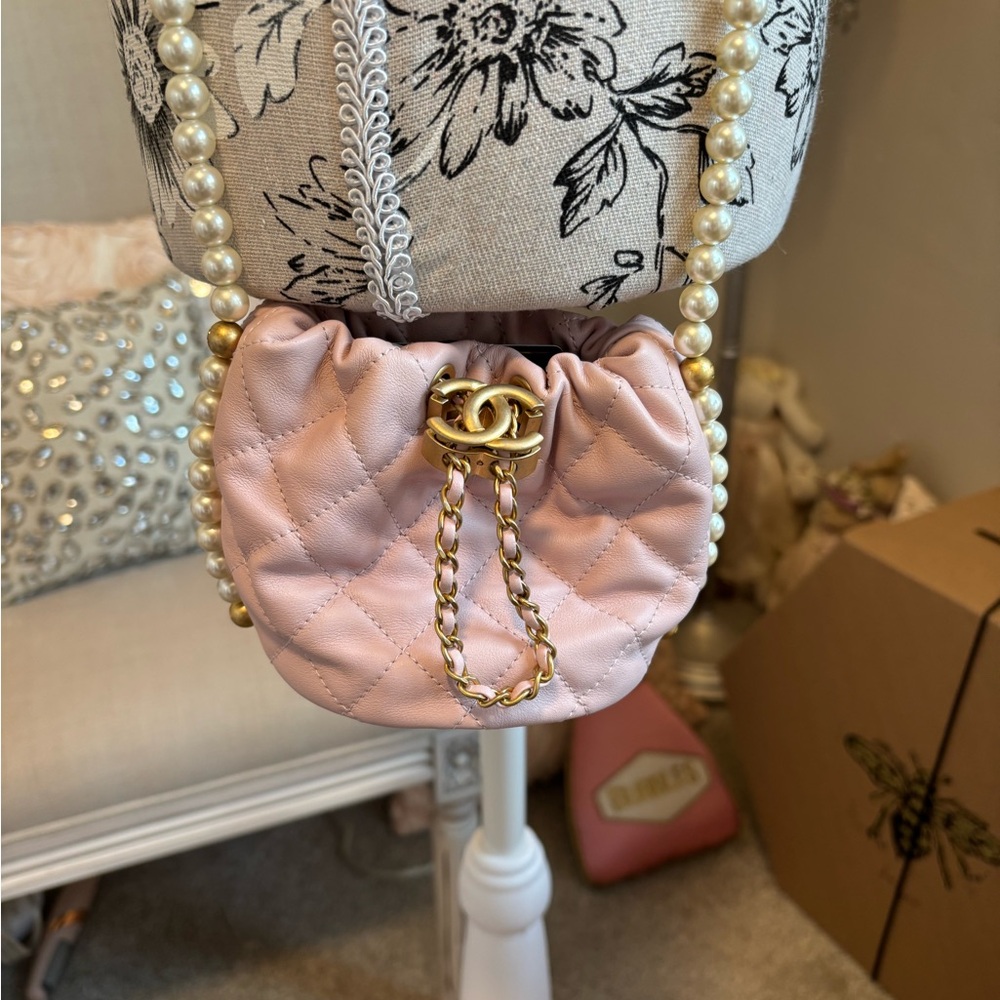 CHANEL Light Pink Quilted Mini Drawstring Bag with Pearl Chain. Never Used. - Picture 6 of 16
